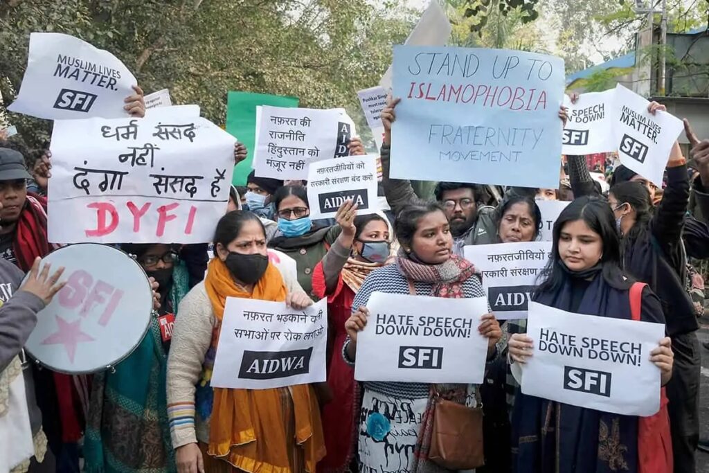 
Members of All India Students Association (AISA), Students Federation of India (SFI) and other organisations protest against Haridwar Hate Assembly where calls were made for genocide against Muslims, outside Uttarakhand Bhavan in New Delhi, Monday, December 27, 2021. (PTI Photo)